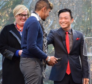 Chanel DeLaney, Mark Ng greet scholarship recipient Abdon Orrostie (PRNewsFoto/National AIDS Memorial Grove)